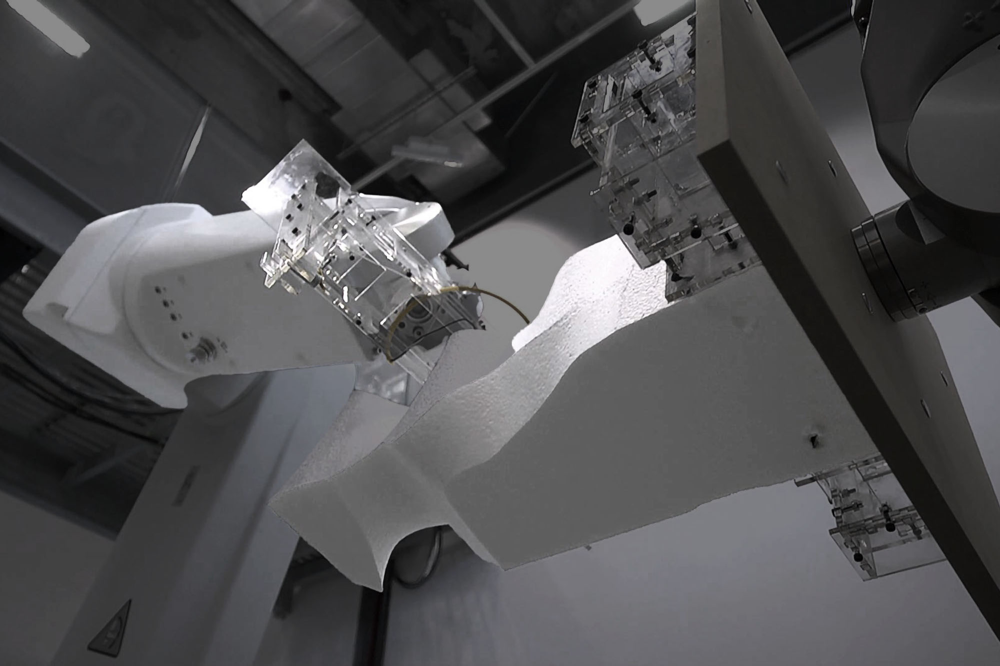 Robotic arm with hot wire cutter
