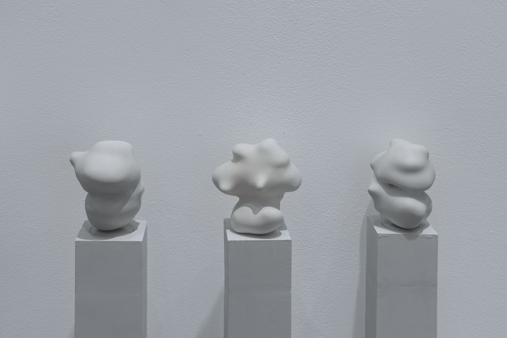 Twisted Torus, three smaller sculptures